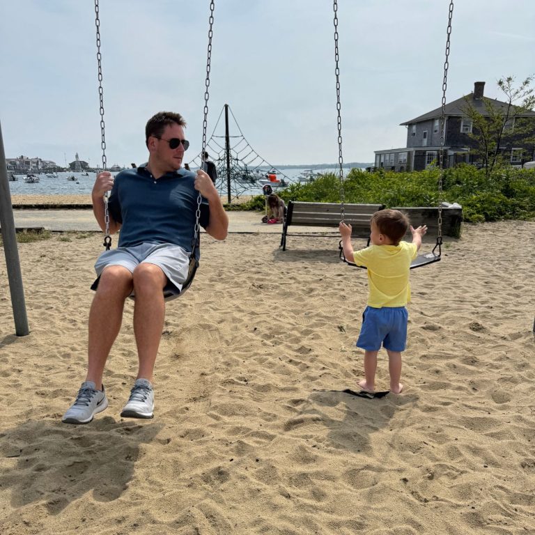Nantucket Itinerary with kids Children's Beach swings dad and son