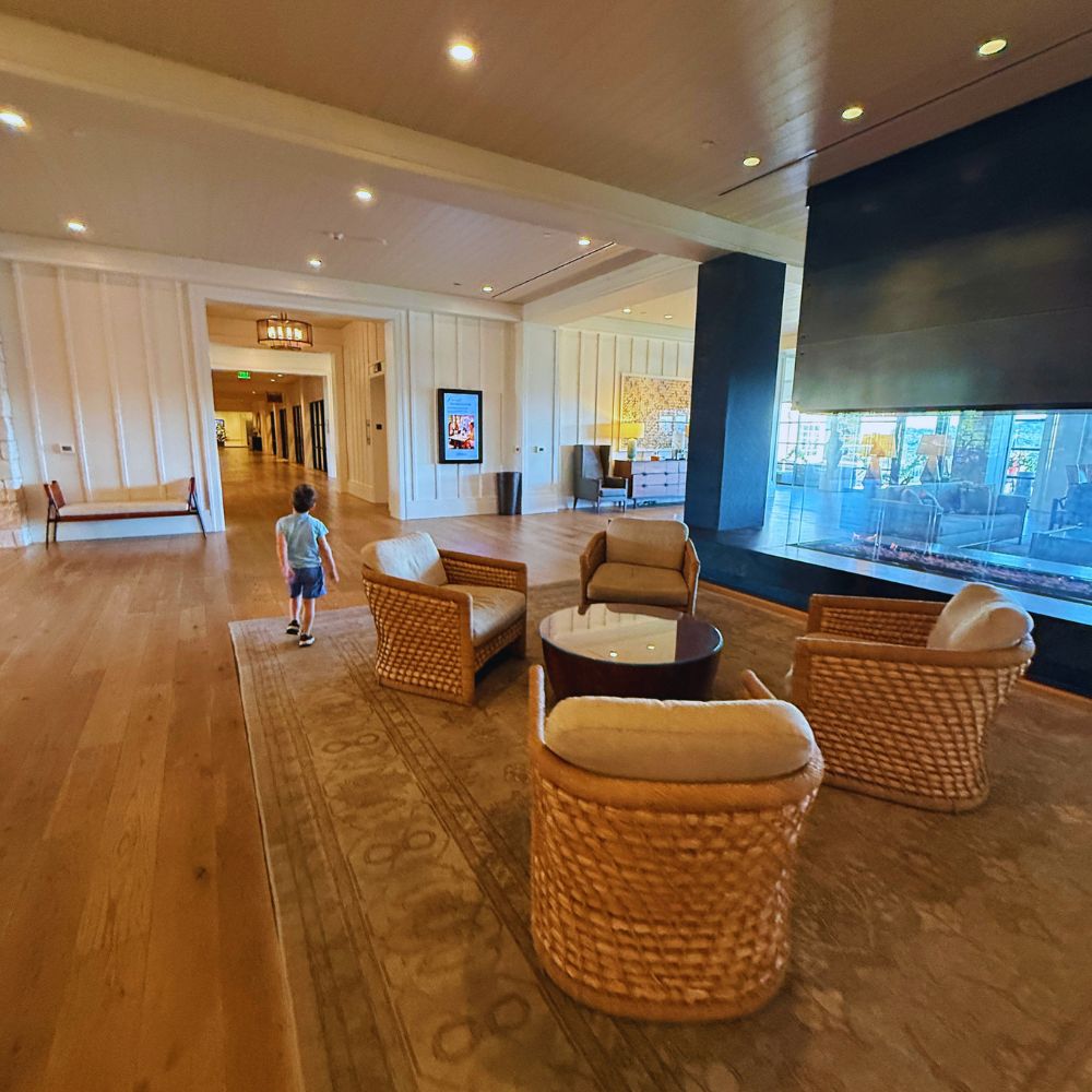 Omni Barton Creek with kids lobby seating and fireplace