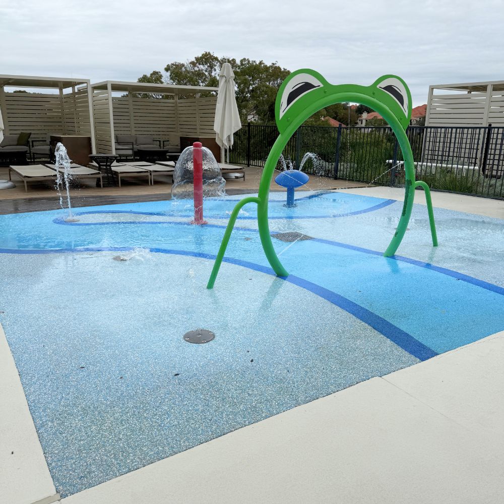 Splash pad with frog water feature at Omni Barton Creek Resort and Spa in Austin Texas