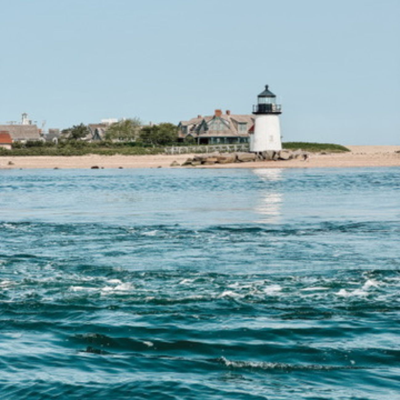 Nantucket harbor lighthouse sunny summer day