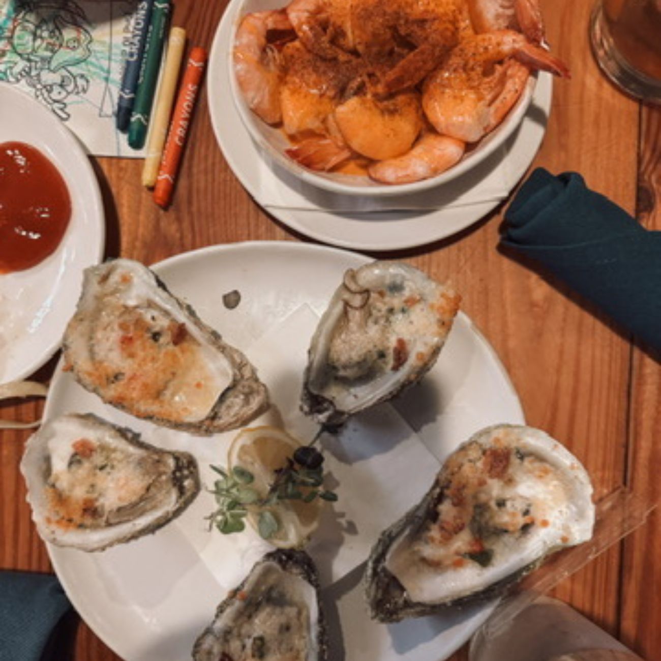 Savannah seafood dinner with coloring book and crayons on table